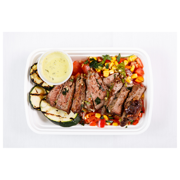LL 3.4 Chipotle Steak with Corn, Tomato & Pepper Salad and Grilled Zucchini. Served with Avocado Crema (GF, DF)